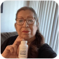 Customer photo holding product bottle